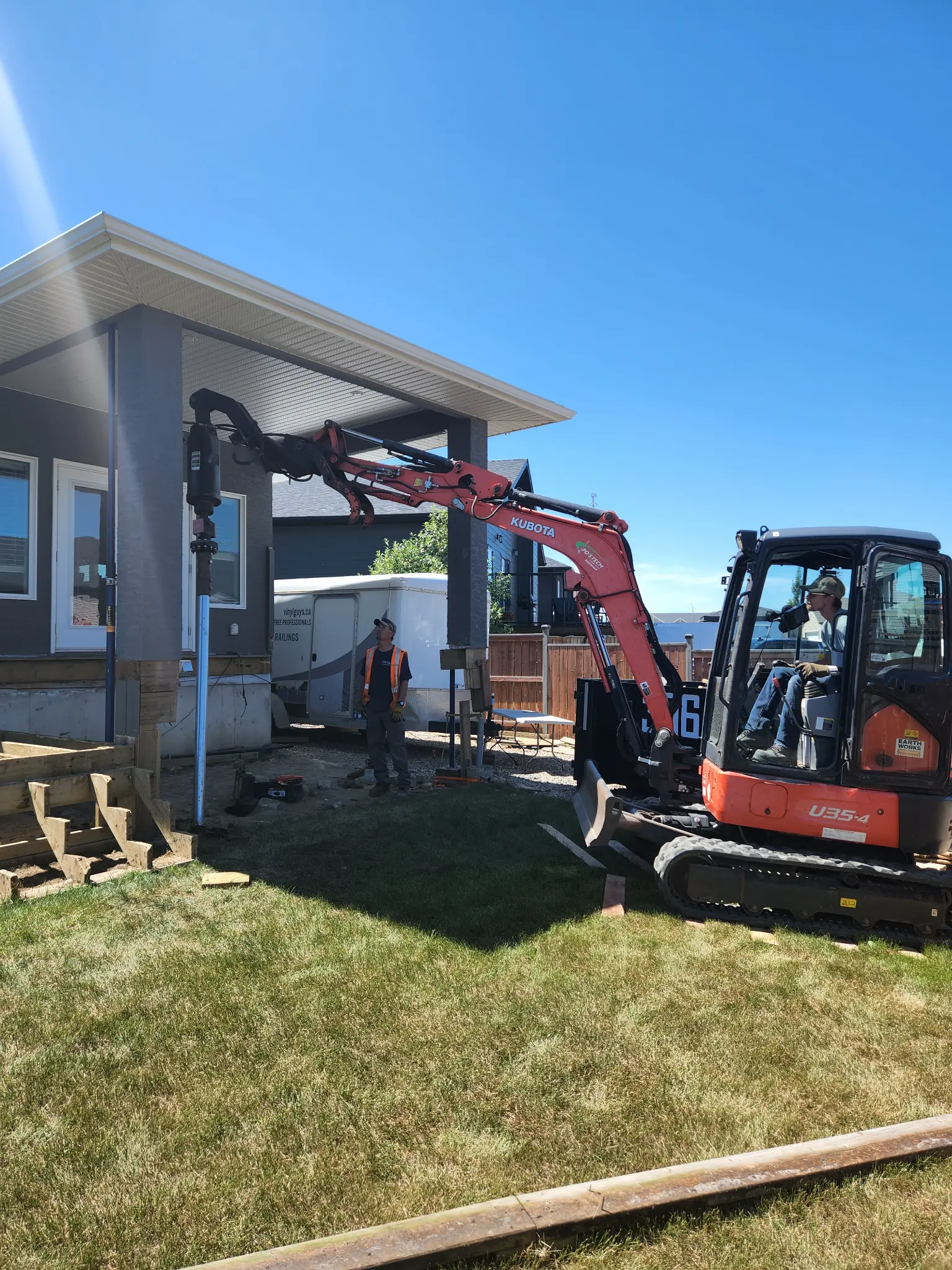 Screw pile installation Saskatoon deck foundation