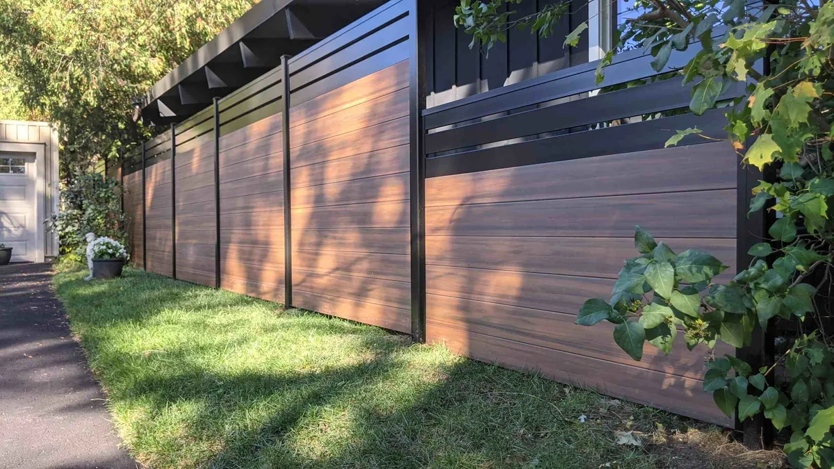 Hybrid vinyl steel fence Saskatoon