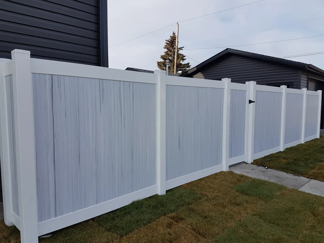 Woodgrain vinyl fence Saskatoon
