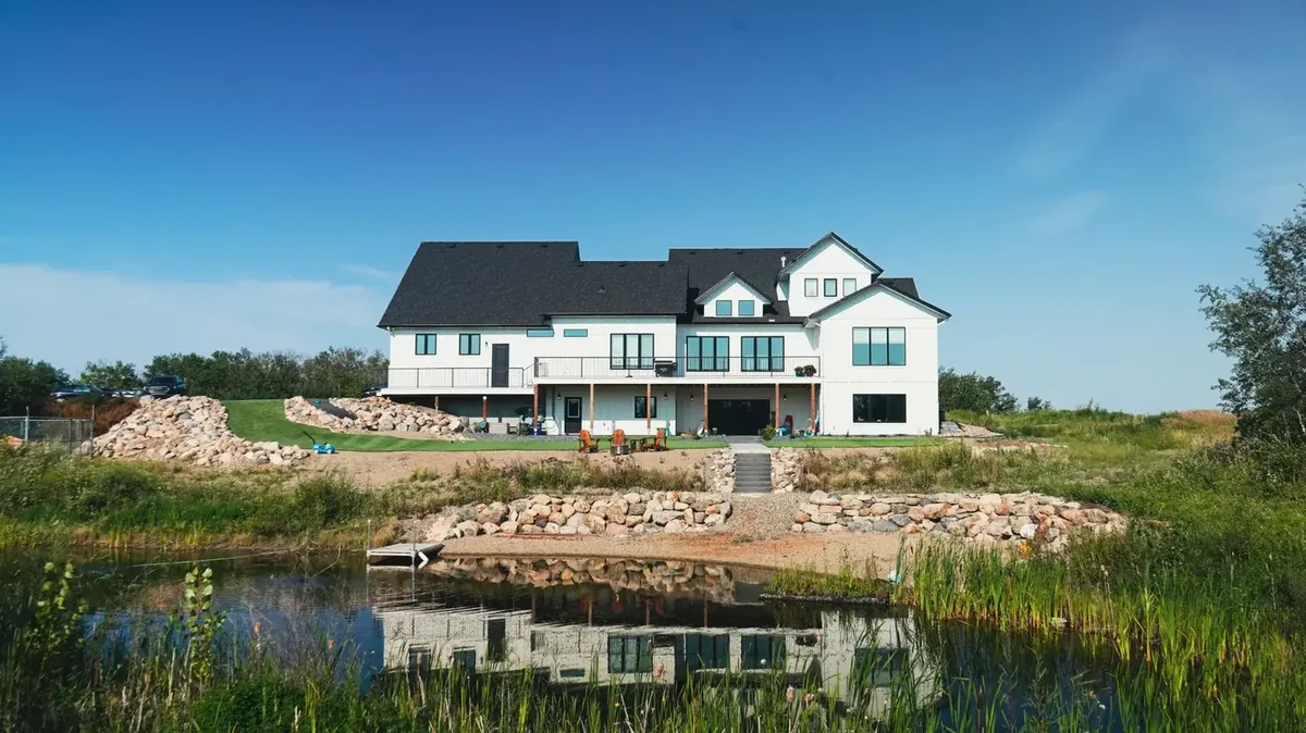 Completed Applewood Estates deck Saskatoon SK — full rear view with pond