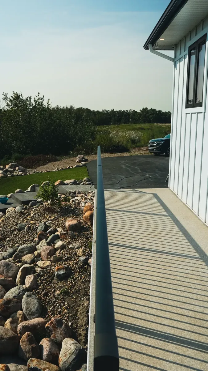 PVC walkway along house Applewood Estates Saskatoon