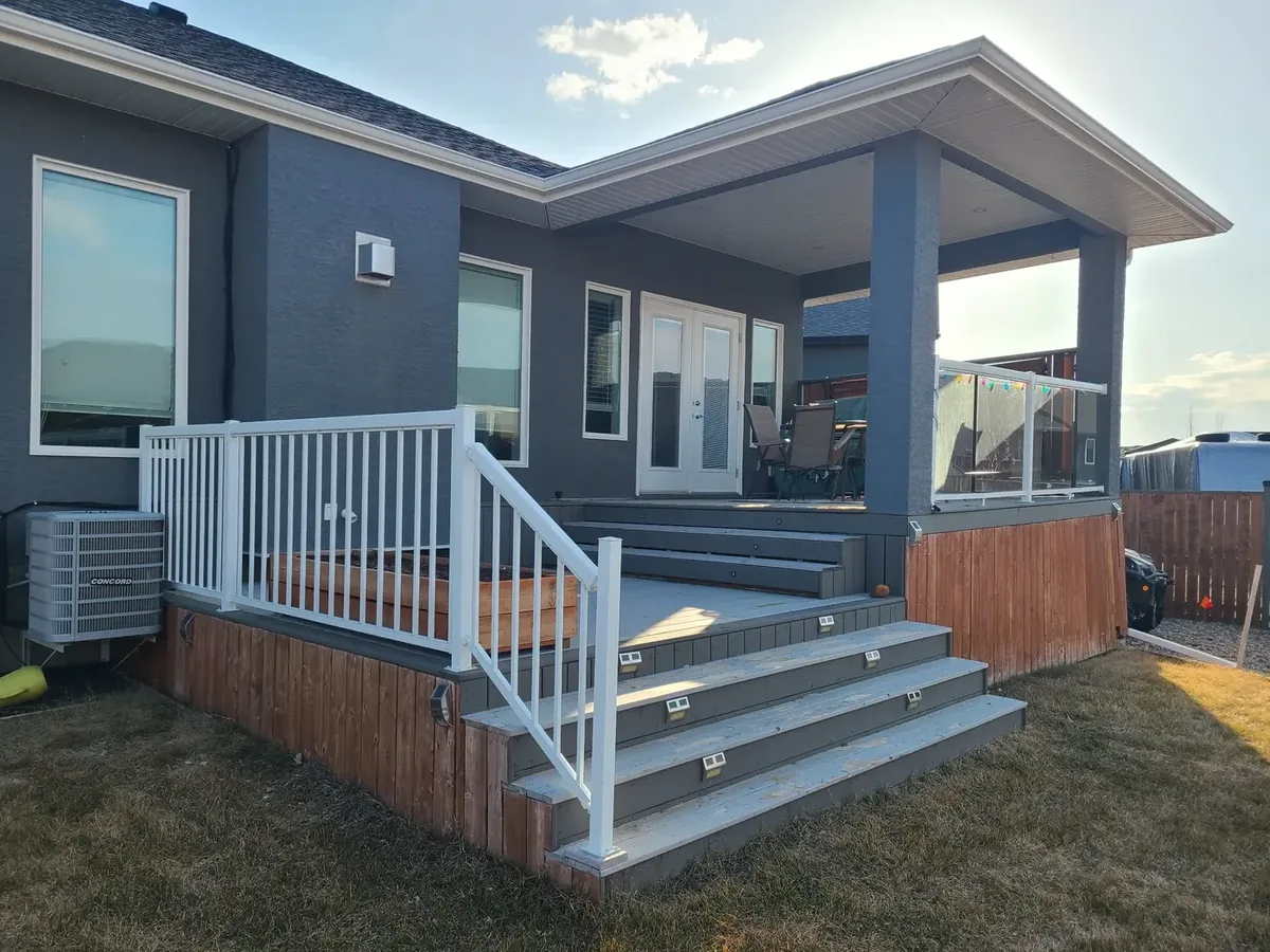 Original deck before rebuild — warped skirting, heaving structure, Warman SK