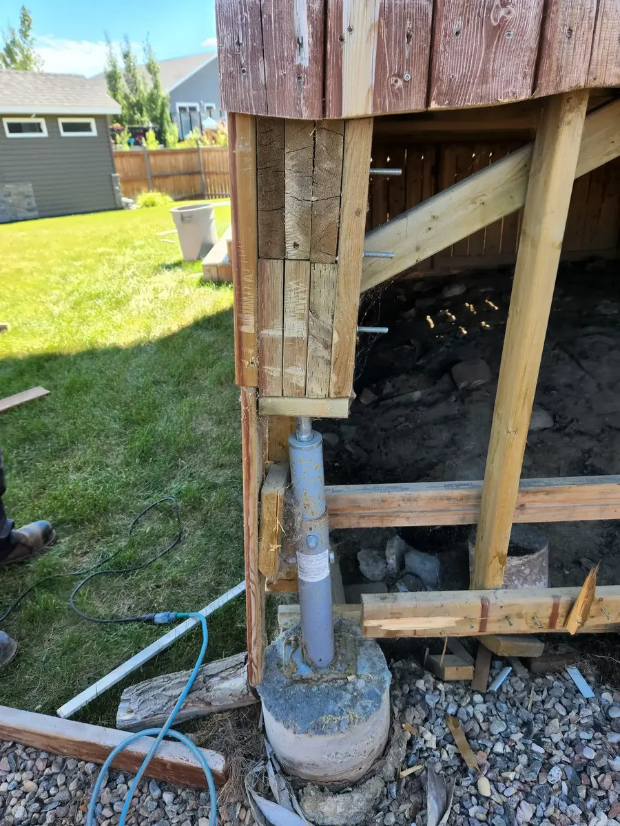 Exposed concrete tube pile showing frost heave damage, Warman SK